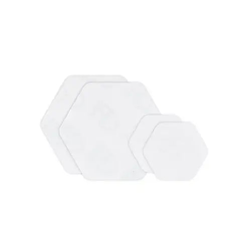 Three white hexagons of different sizes overlap on a plain white background, symbolizing the powerful bond and ultra-aggressive adhesive of Gear Aid Tenacious Tape Hex Patches by Gear Aid for a seamless, weatherproof finish.